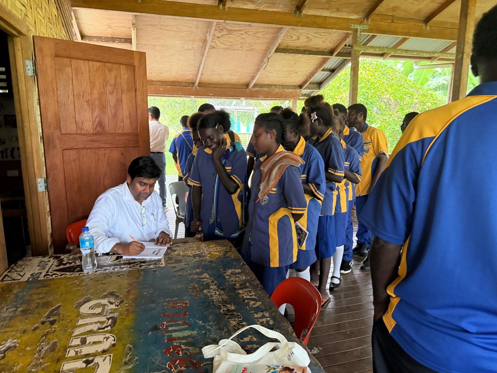 Students meeting the visiting team in Bougainville